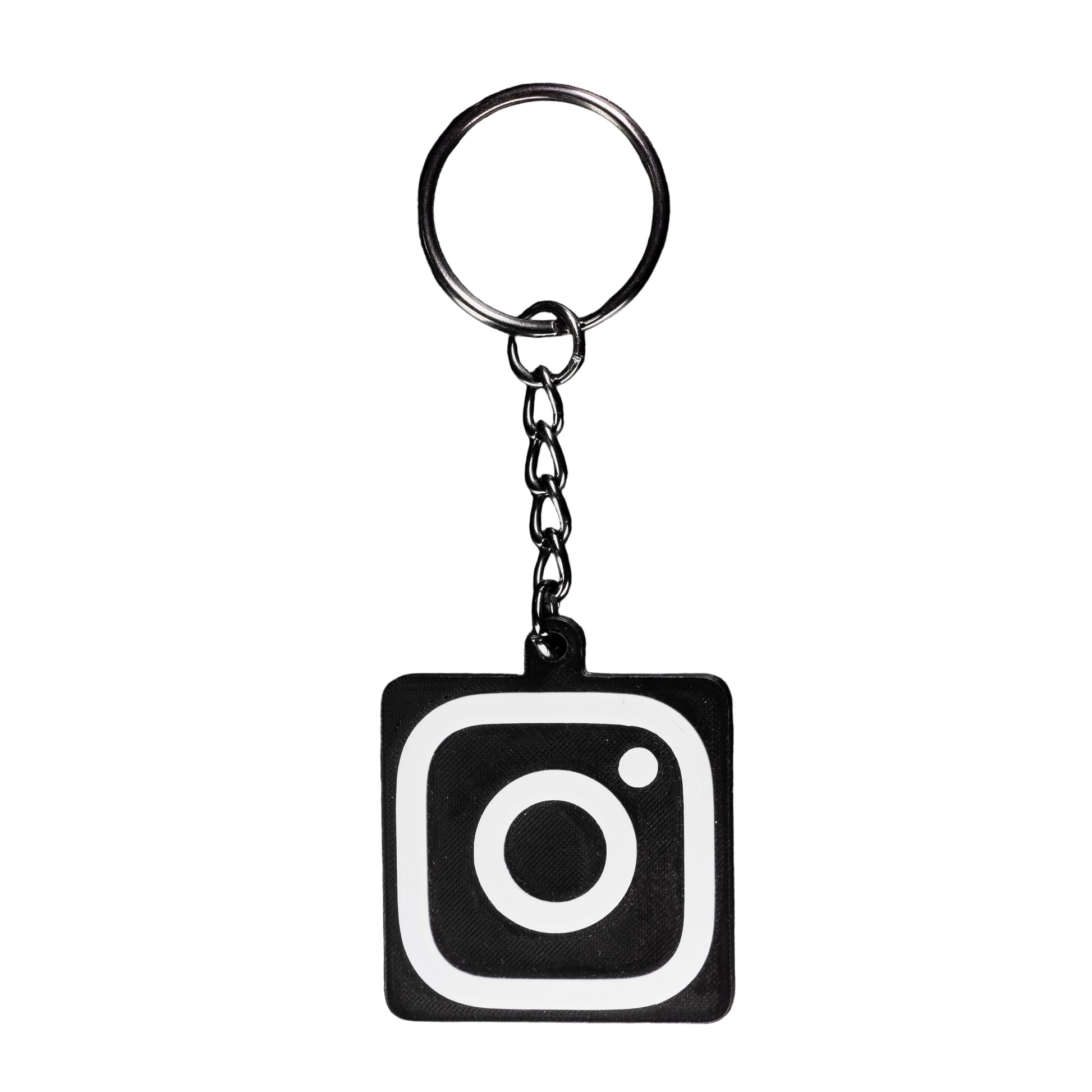 Keychain with Instagram logo on a black background