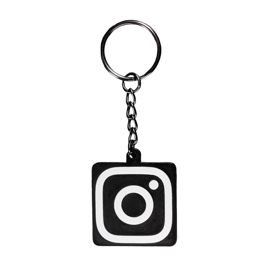 Keychain with Instagram logo on a black background