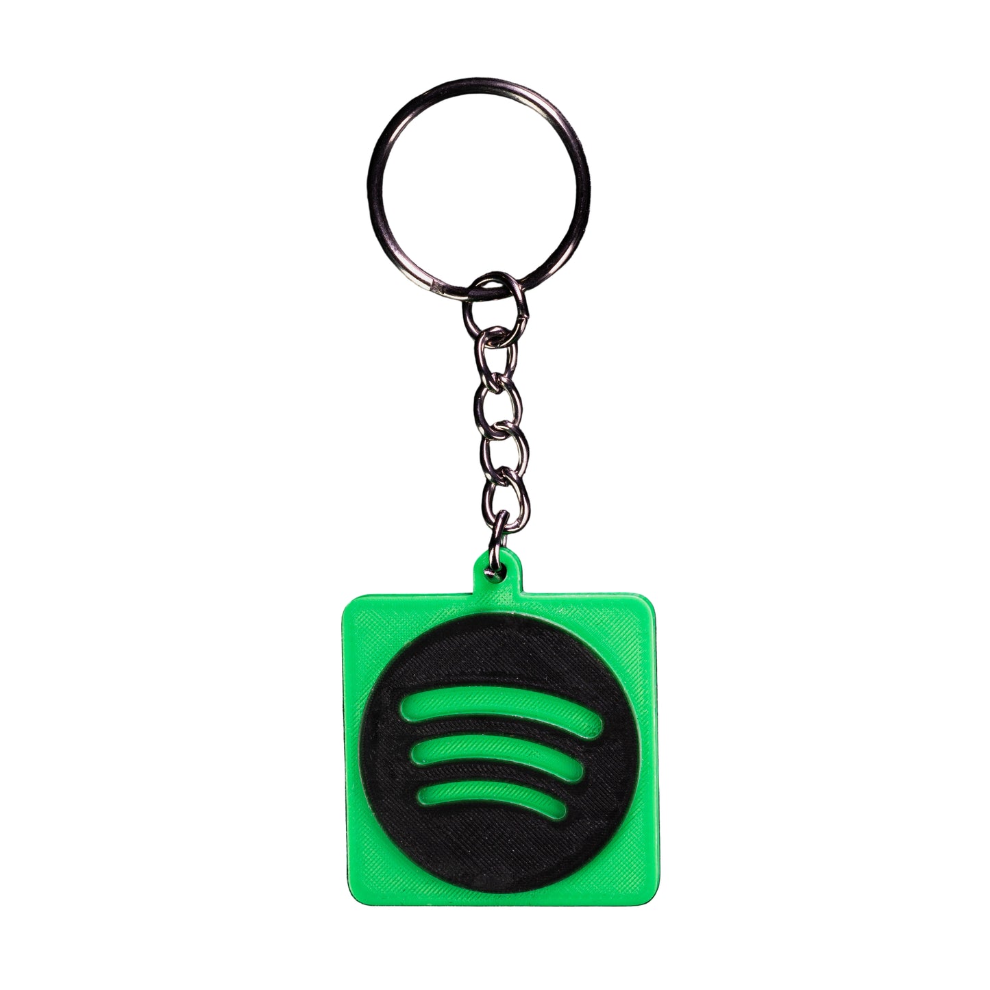 Green and black keychain with Spotify logo on a black background